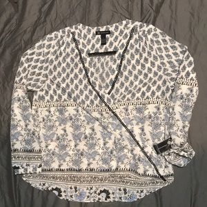 INC Blouse in Black, White, and light blue.